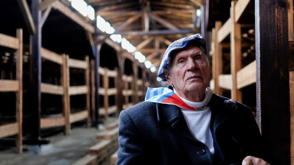 Stanislaw Zalewski in the historic barrack in Auschwitz II Birkenau concentration camp c CEE FILMS